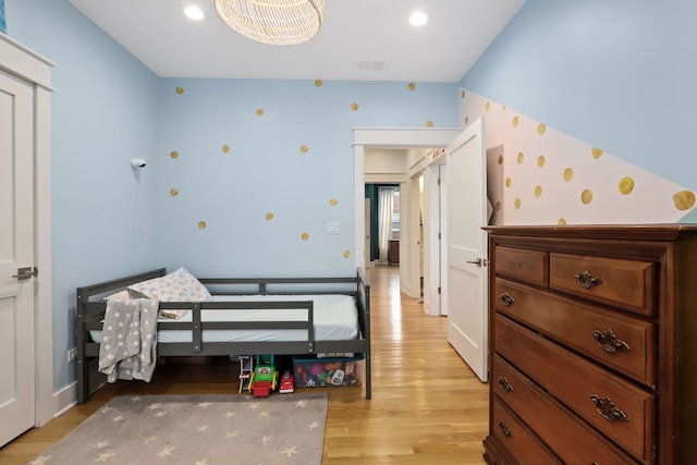 bedroom featuring light wood-type flooring