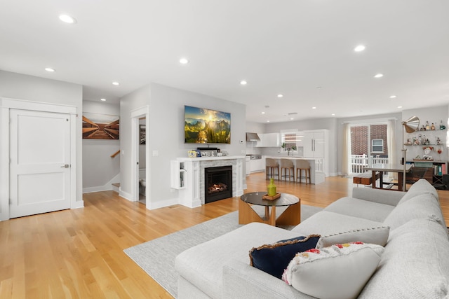 living room with light hardwood / wood-style floors