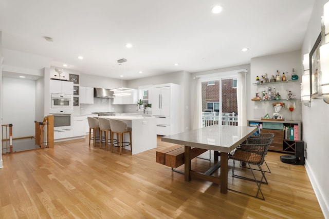 dining area featuring light hardwood / wood-style flooring