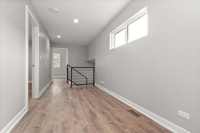 hall featuring light hardwood / wood-style flooring