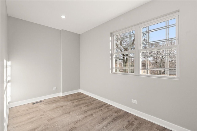 empty room featuring light hardwood / wood-style floors