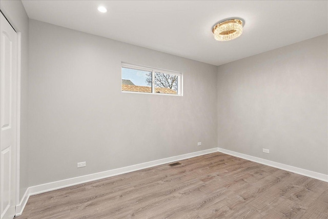 empty room featuring light hardwood / wood-style flooring