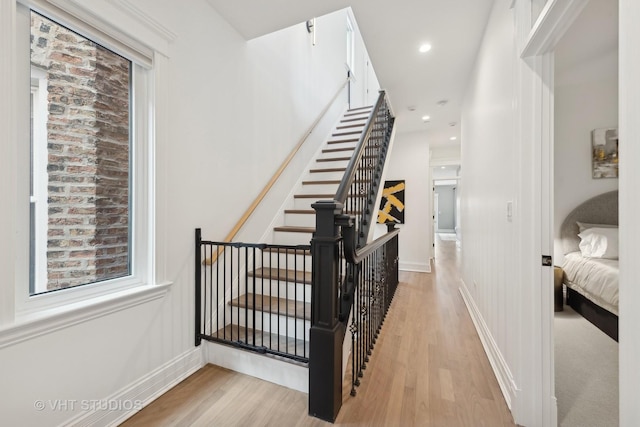 interior space with recessed lighting, baseboards, and wood finished floors