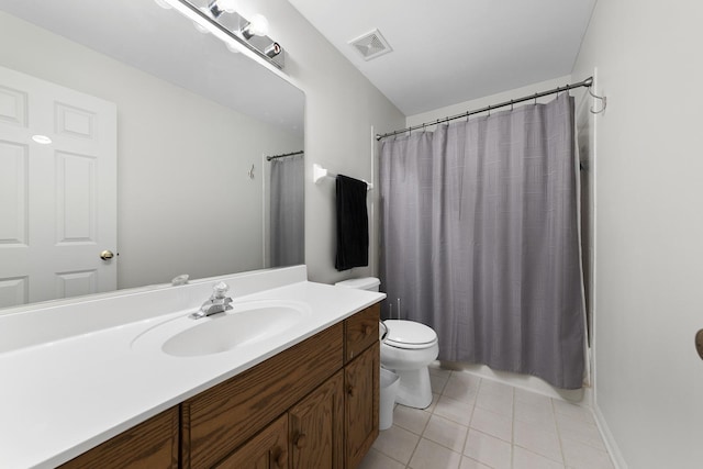 bathroom with vanity, tile patterned floors, toilet, and a shower with shower curtain