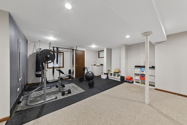 workout area featuring carpet flooring