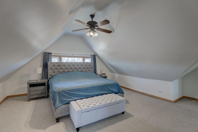 bedroom featuring ceiling fan, light colored carpet, and lofted ceiling