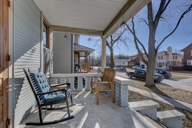 view of patio featuring a porch