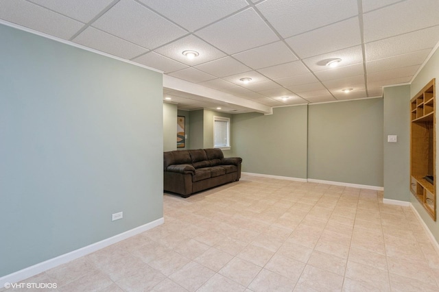 unfurnished room with a paneled ceiling