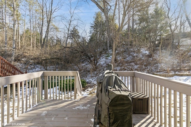 view of snow covered deck