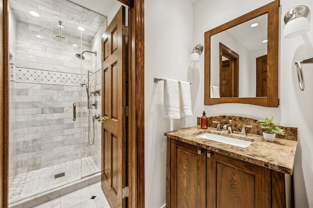 bathroom with vanity and walk in shower