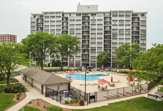 view of pool with a patio and fence