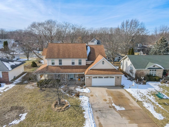 view of front of property featuring a garage