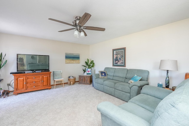 living room with light colored carpet and ceiling fan