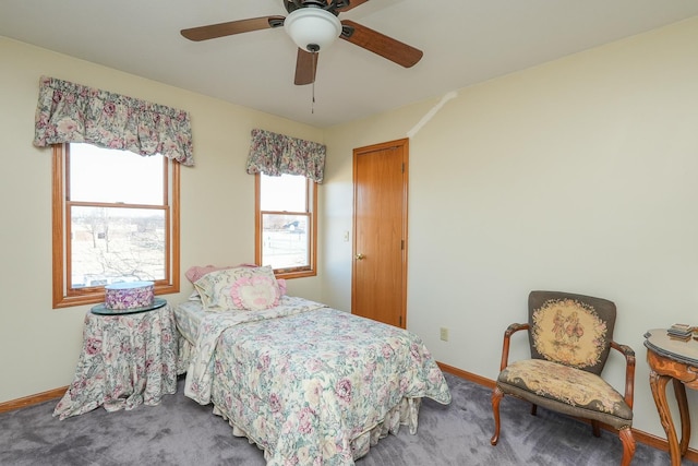 carpeted bedroom with ceiling fan