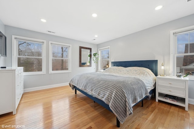 bedroom featuring light wood-type flooring