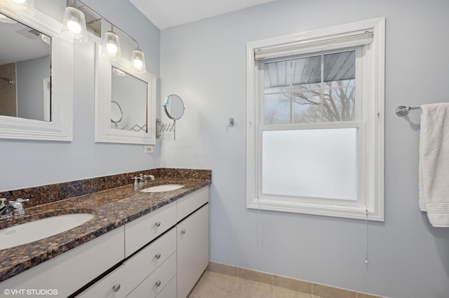 bathroom with vanity and tile patterned floors