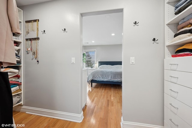 hallway with light wood-type flooring