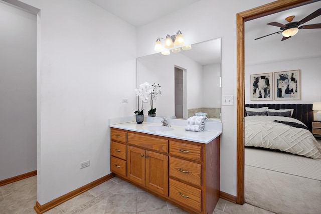 bathroom featuring vanity and ceiling fan