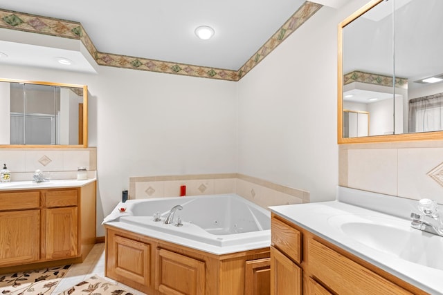 bathroom with vanity, tasteful backsplash, tile patterned floors, and independent shower and bath