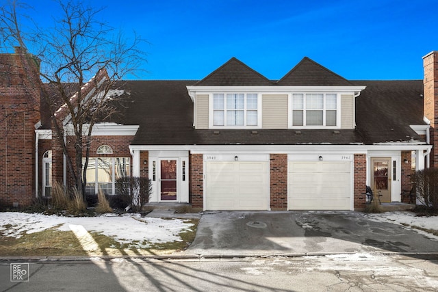 view of front of property with a garage