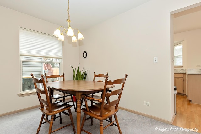 dining room featuring a chandelier