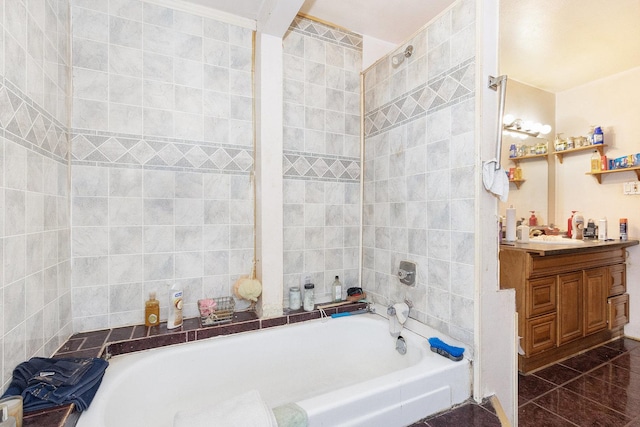 bathroom featuring tile patterned flooring and vanity