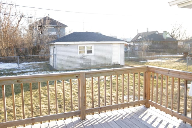 wooden deck with an outbuilding