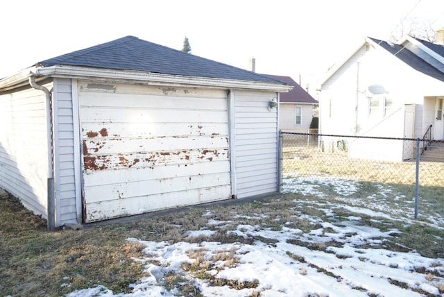 view of snow covered garage