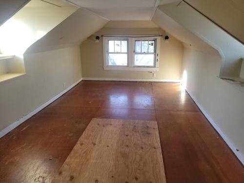 bonus room featuring lofted ceiling