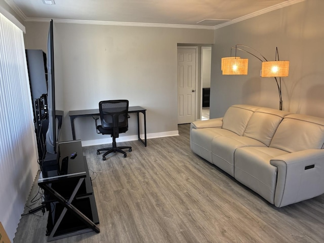 living room with hardwood / wood-style flooring and ornamental molding