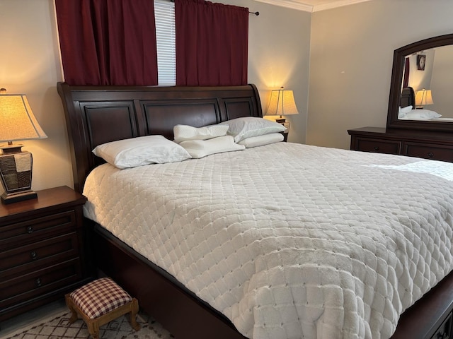 bedroom featuring crown molding