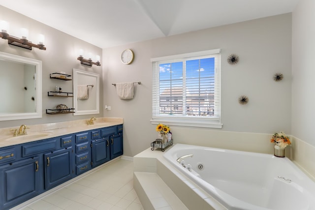 bathroom featuring vanity, tile patterned flooring, and a relaxing tiled tub