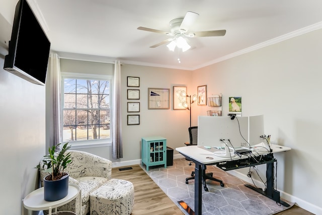 office space featuring crown molding, ceiling fan, and hardwood / wood-style flooring