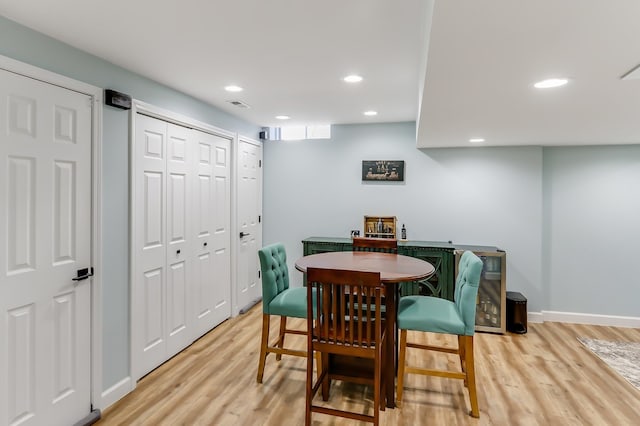 dining room featuring light hardwood / wood-style flooring