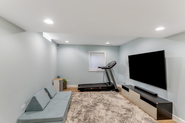 workout area featuring hardwood / wood-style flooring