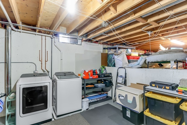 laundry room with washer and dryer