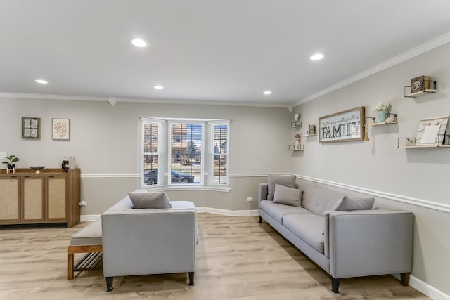 living room featuring ornamental molding and light wood-type flooring