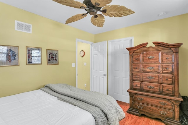 bedroom featuring ceiling fan and light wood-type flooring