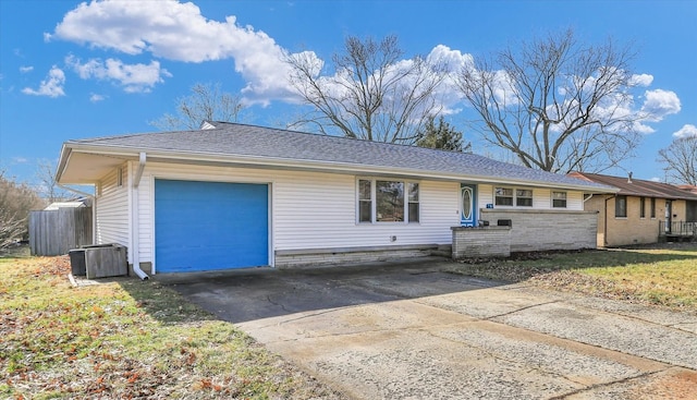 ranch-style house featuring a garage