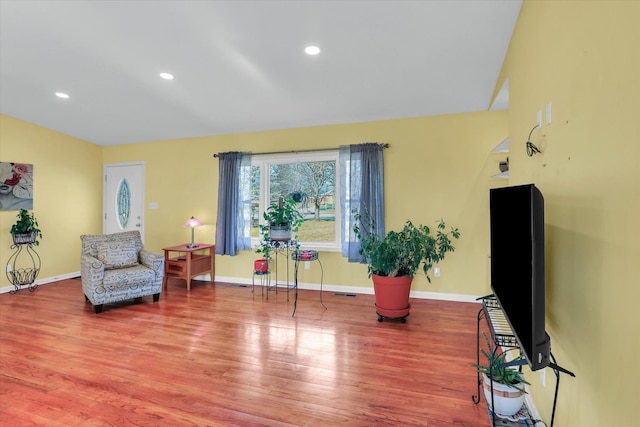 sitting room featuring wood-type flooring