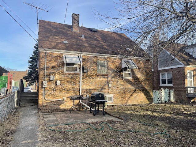 rear view of house with a patio area