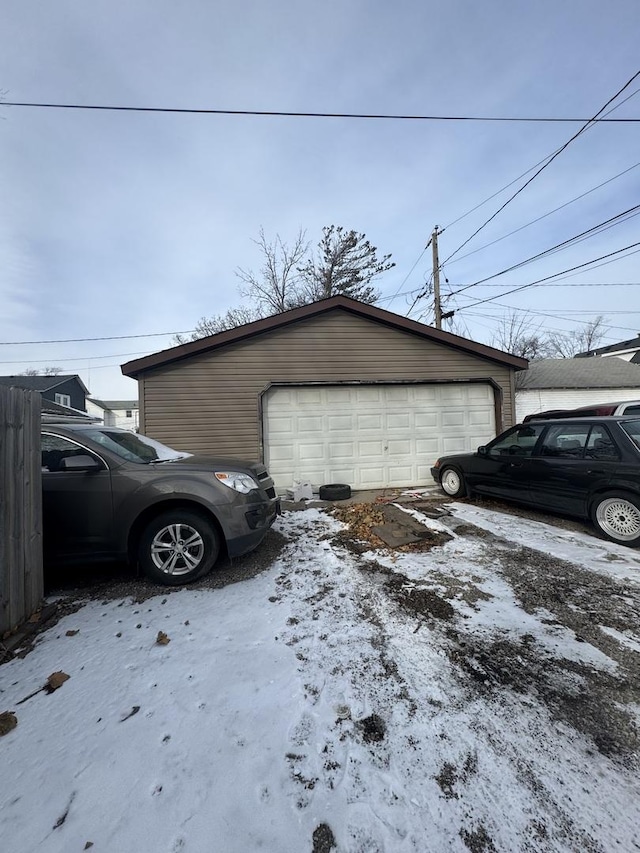 view of snow covered garage