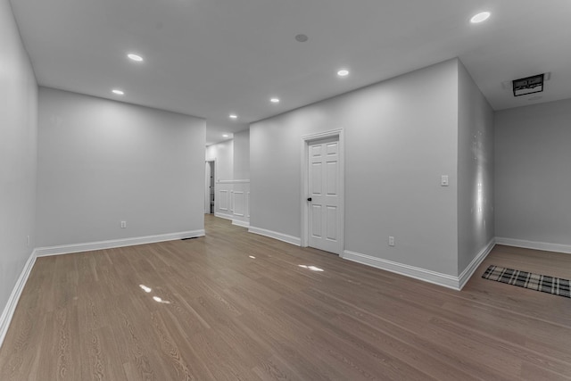 spare room featuring light hardwood / wood-style floors