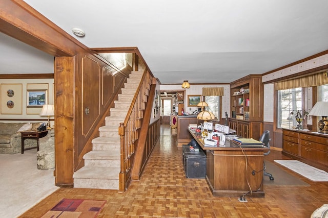 office area with ornamental molding and parquet flooring