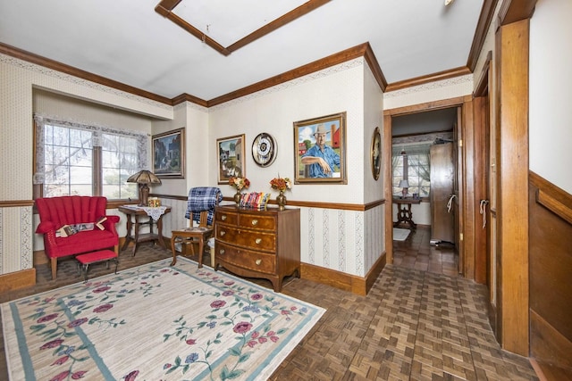 living area featuring crown molding and dark parquet flooring