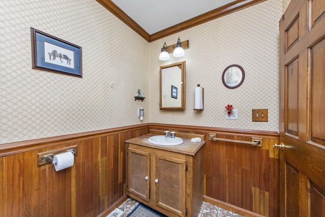 bathroom featuring vanity and ornamental molding