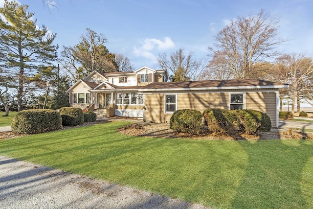 view of front of home with a front lawn and covered porch