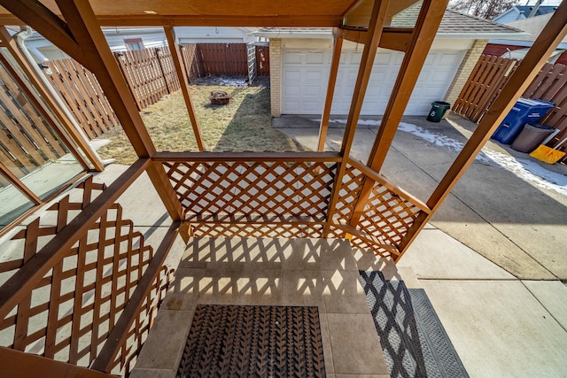 view of patio / terrace with a garage