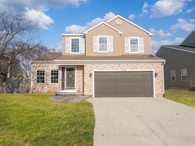 view of front of house featuring a garage and a front yard