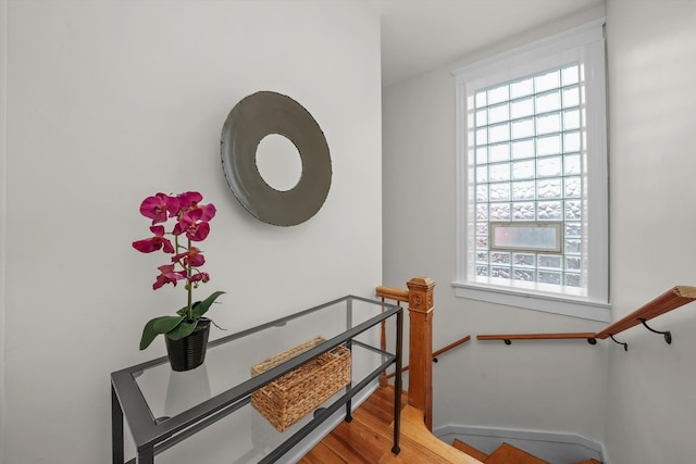 staircase featuring hardwood / wood-style floors